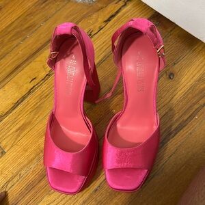 Pink chunk block heels.